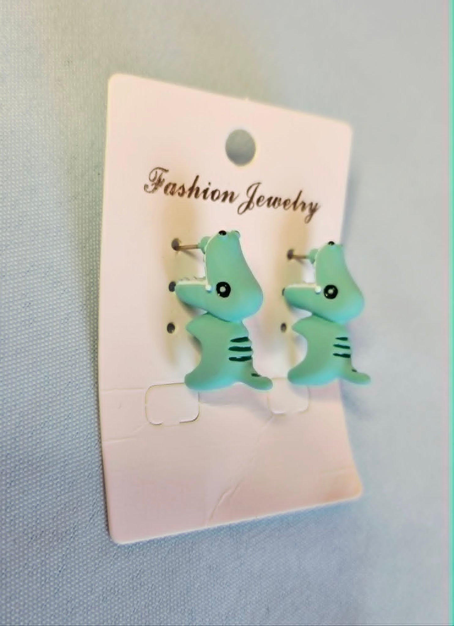 Dinosaur stud earrings