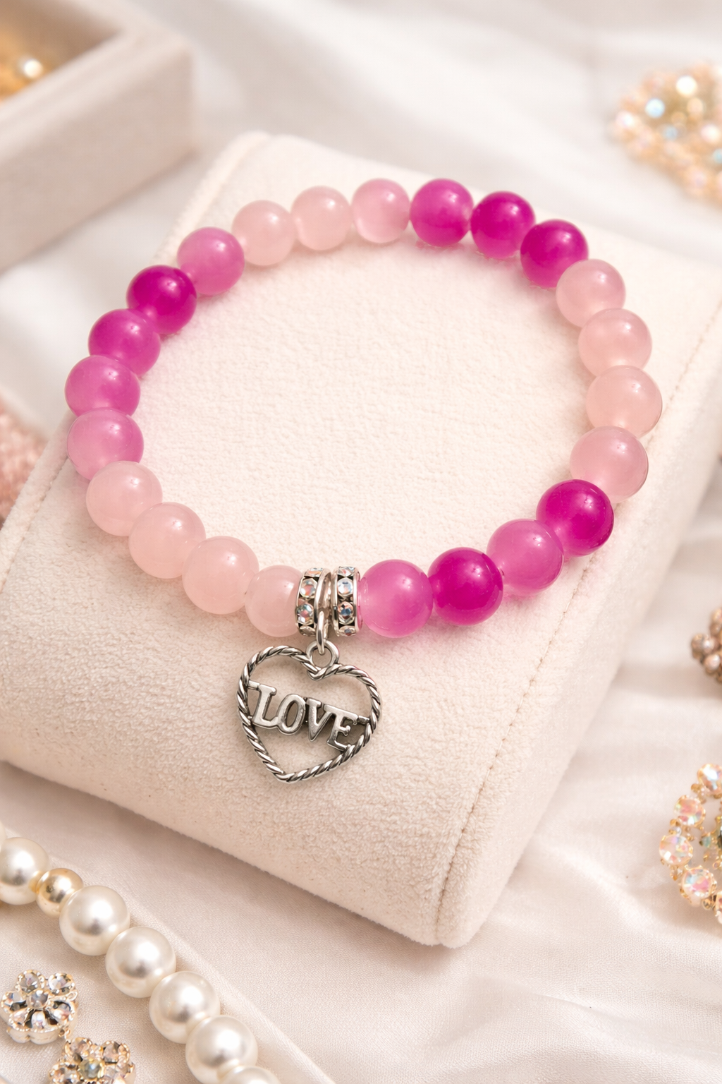 Pink Two tone glass beads with a love heart charm handcrafted glass bead bracelet