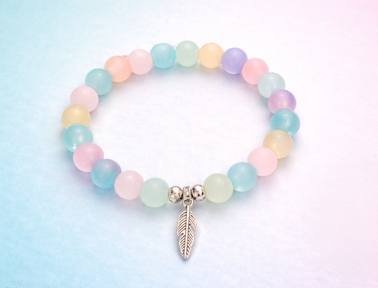 Sky lite handcrafted glass bead bracelet random coloured beads with a feather charm