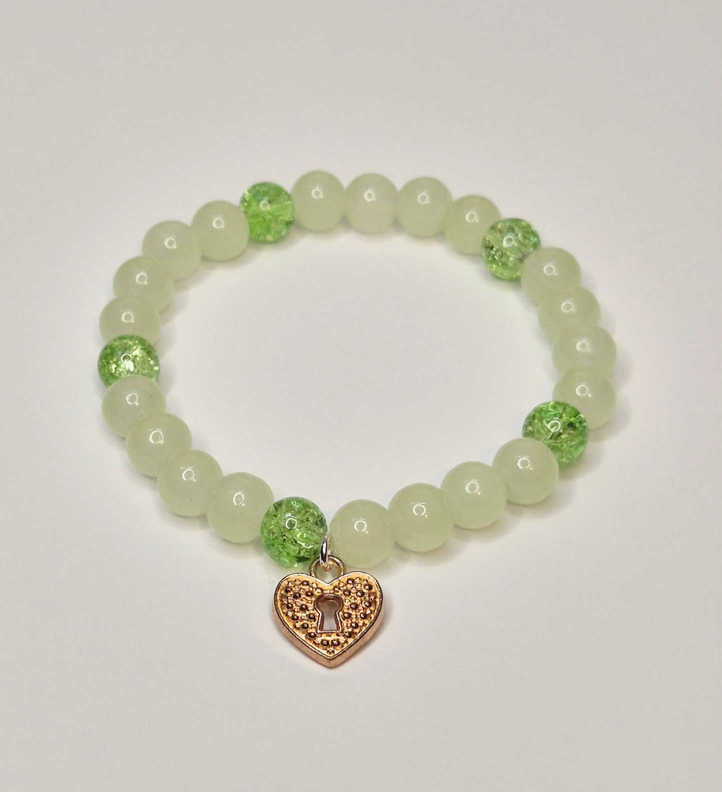 Green glass bead Bracelet with gold heart charm