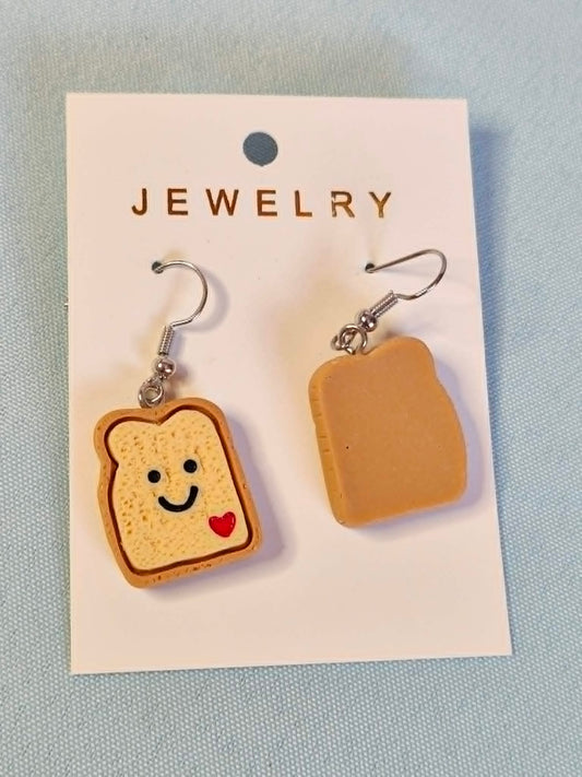 Smiley toast dangly earrings