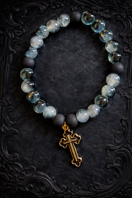 Black two tone beads with a black cross charm handcrafted glass bead bracelet