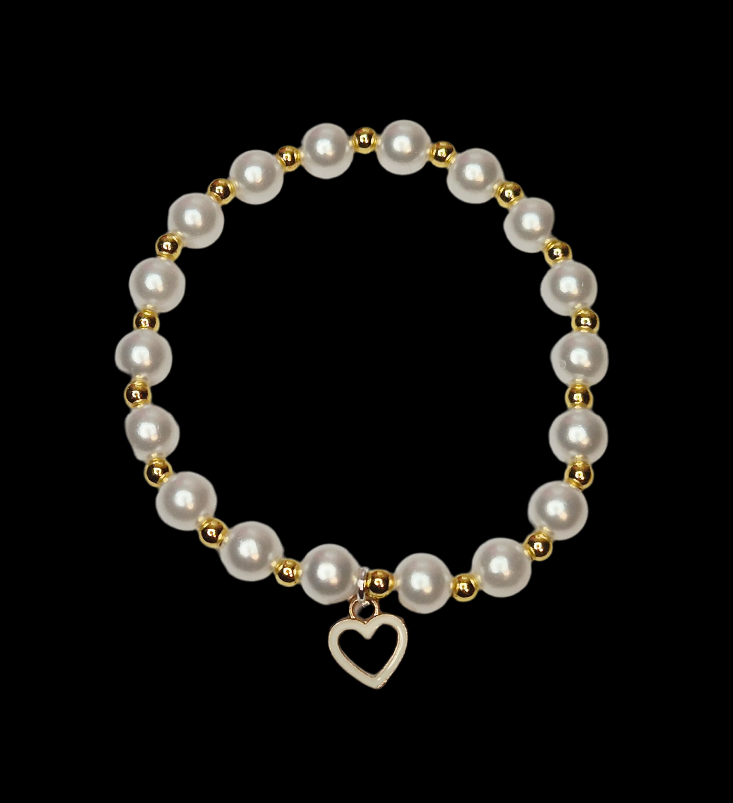 White glass bead bracelet with gold spacers and a white heart charm