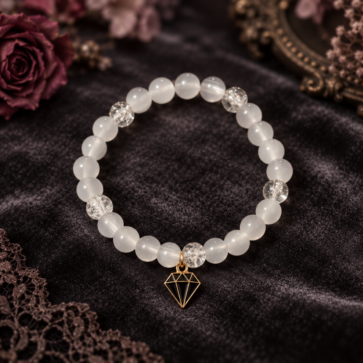 White handcrafted glass bead bracelet with a black diamond charm