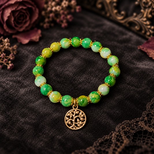 Green beads 2 tone with gold spacers and a Gold tree of life Charm handcrafted glass bead bracelet