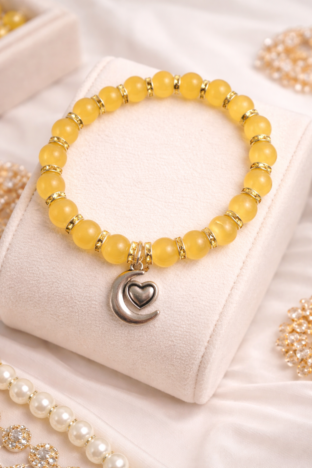Yellow beads with gold spacers with heart in moon charm handcrafted glass bead bracelet