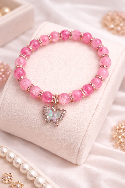 Pink Two tone glass beads with a butterfly charm handcrafted glass bead bracelet